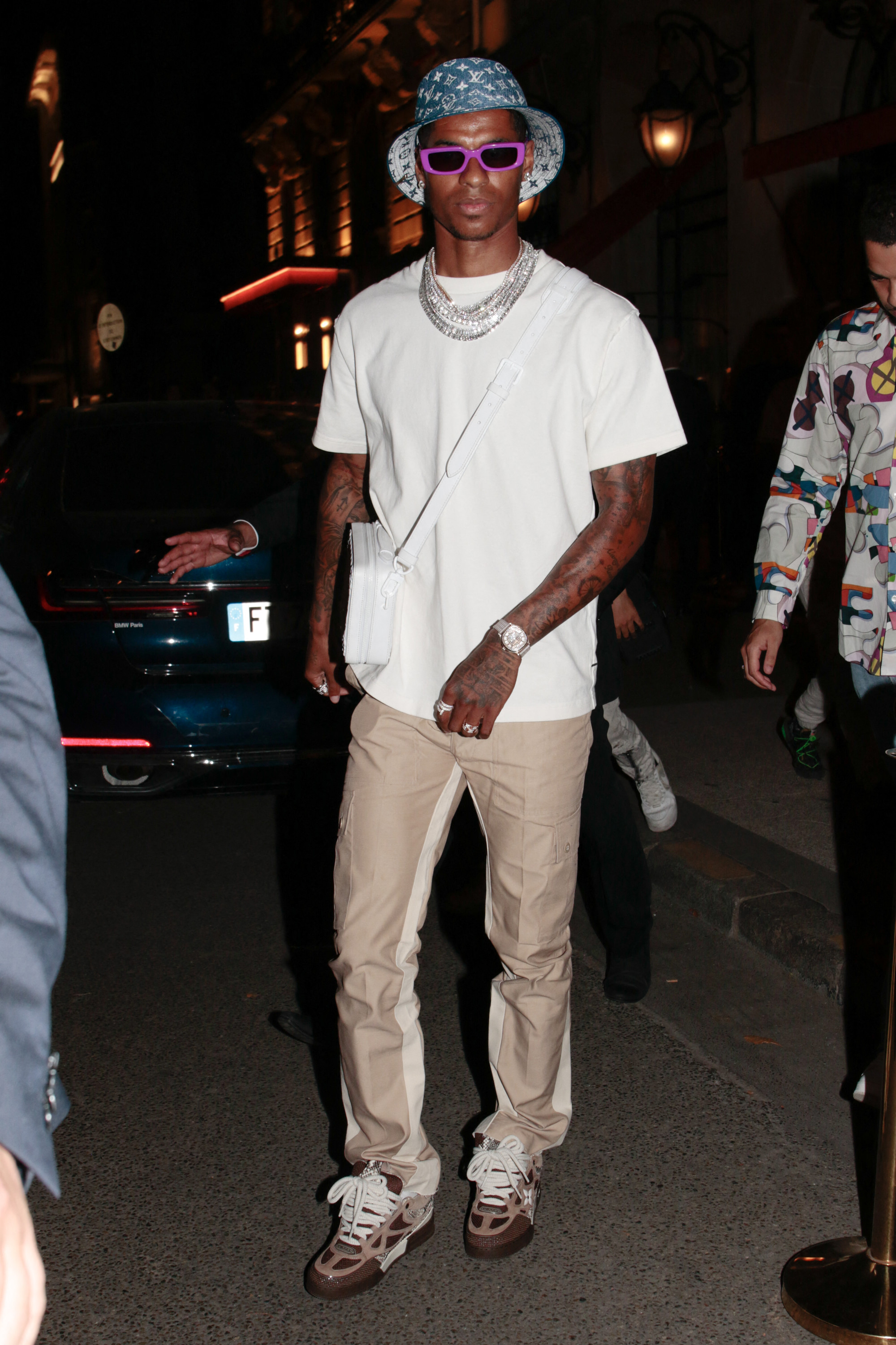 Rashford wore an LV bucket hat for the after party