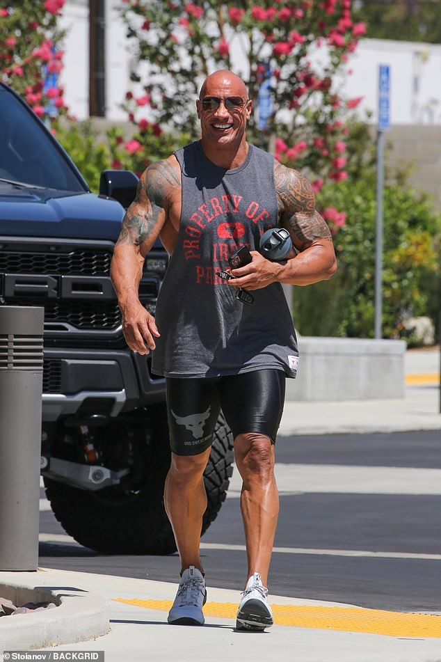 The Rock smiles: Dwayne Johnson started his week out strong as he headed to a gym to work out on Monday afternoon