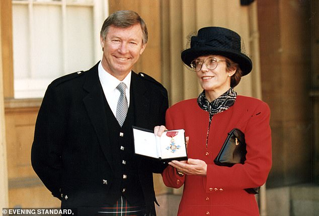 The couple, pictured here as Sir Alex received his CBE at Buckingham Palace, had three sons together