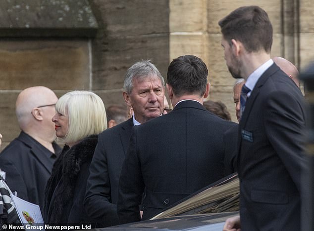 Man United's longest-serving captain Bryan Robson (centre) supported his former manager