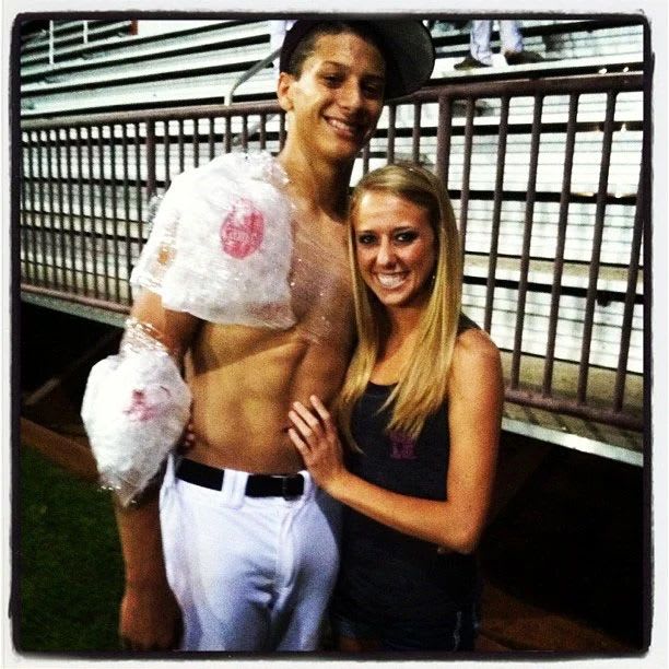 Brittany Mahomes cuddles into  Patrick Mahomes during high school