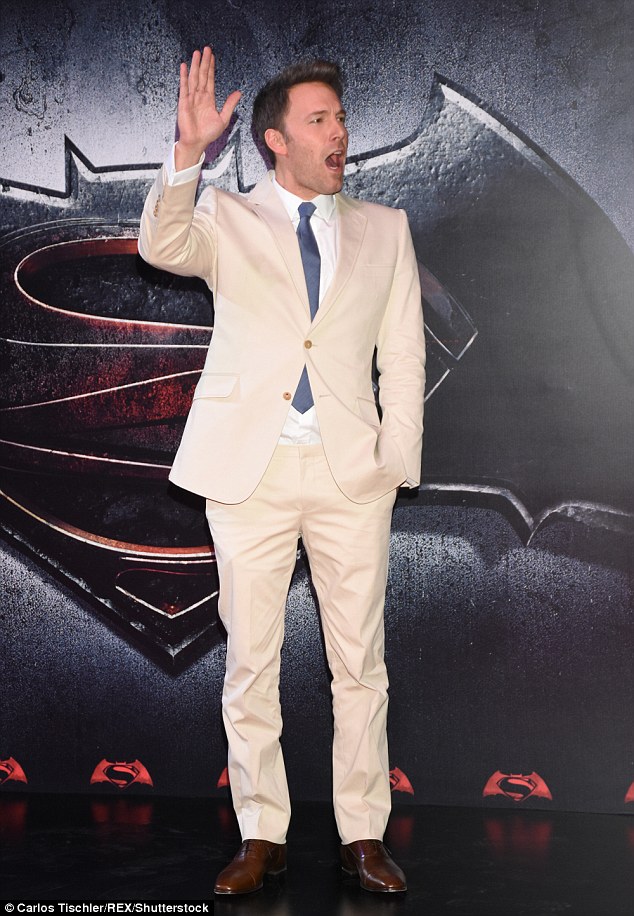 Crowd pleaser: Affleck grinned as he waved towards the crowd 